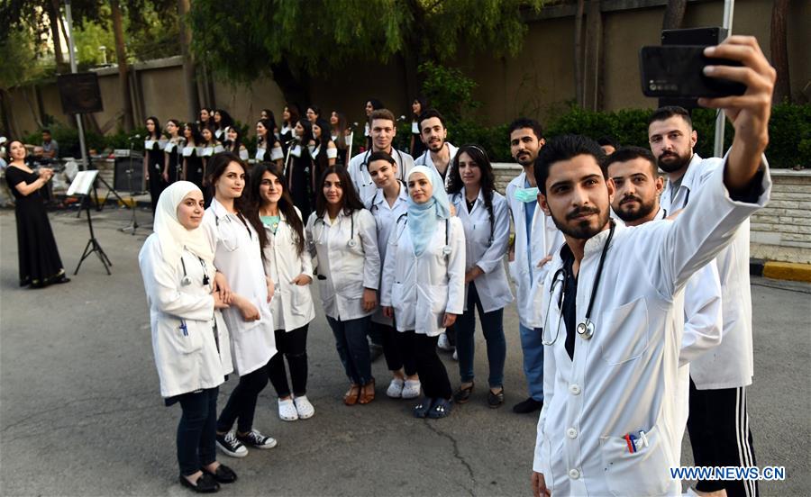 SYRIA-DAMASCUS-CHOIR-COVID-19-MEDICAL WORKERS